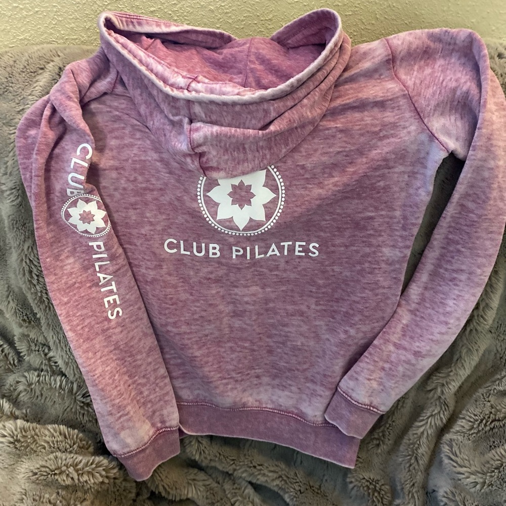 Club Pilates branded zip hoodie.